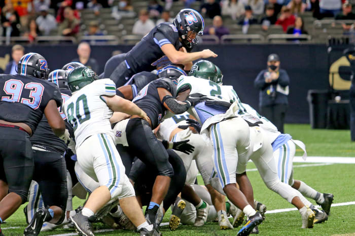 Zachary quarterback Eli Holstein (10) leaps in for a 1-yard score in the third quarter of the Class 5A State Championship game between Ponchatoula and Zachary at the Caesars Superdome on Saturday, December 11, 2021. (Michael DeMocker) Class5achamp07